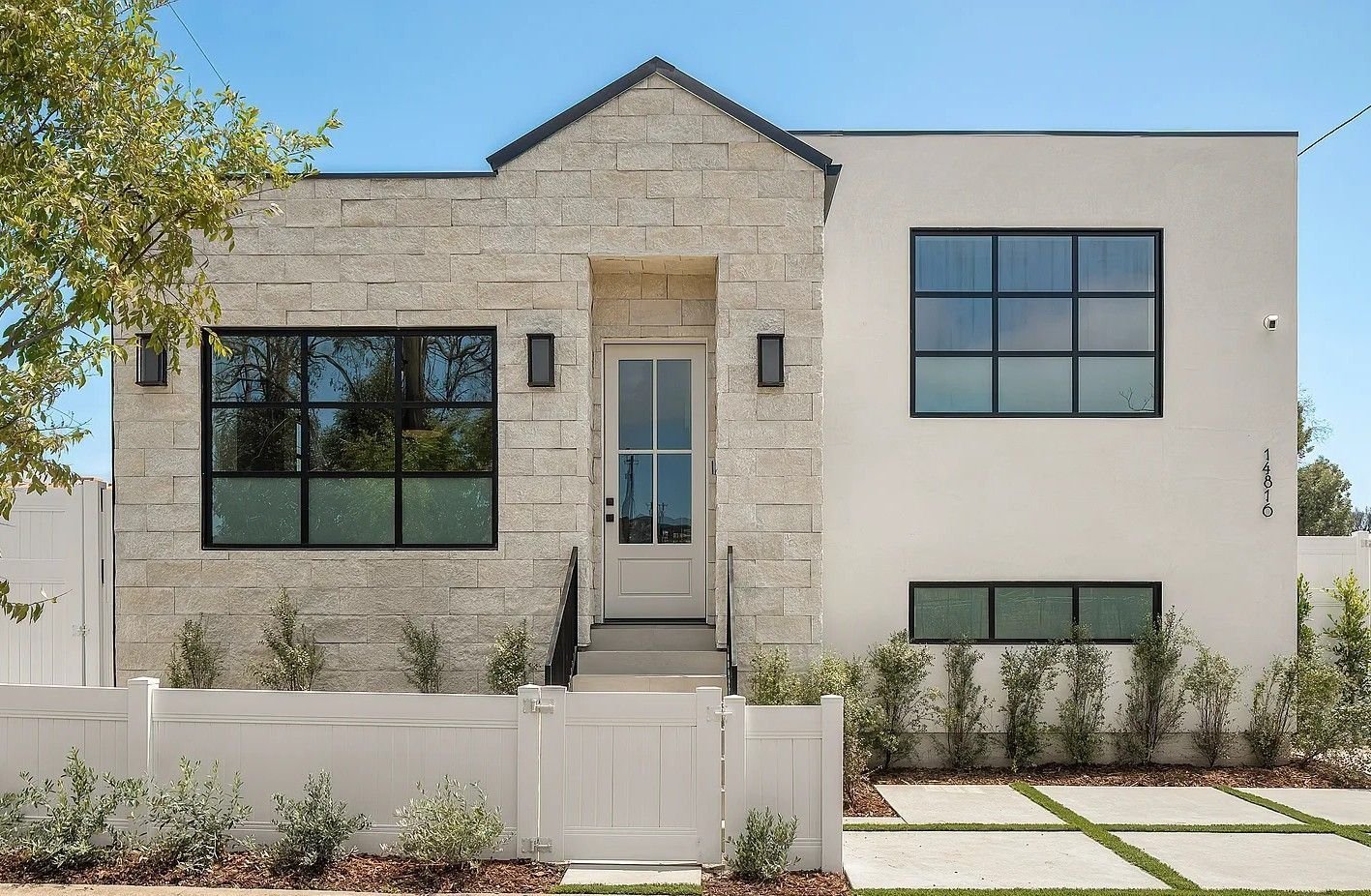 Freshly painted coastal home exterior with clean trim lines
