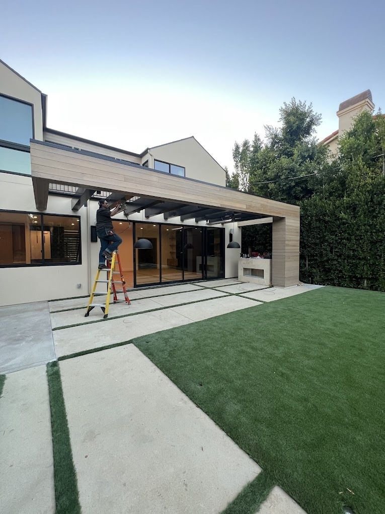 Coastal home with fresh exterior paint and clean white trim in Malibu