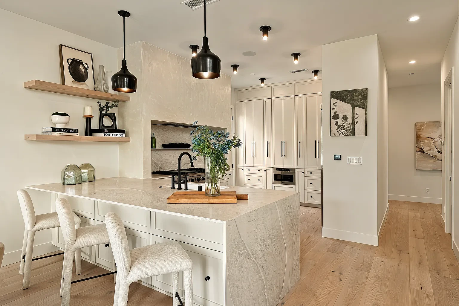 Painted kitchen cabinets and warm white walls in a Westside Los Angeles home