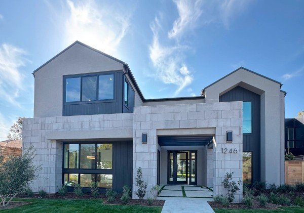 Freshly painted coastal home exterior with clean white trim